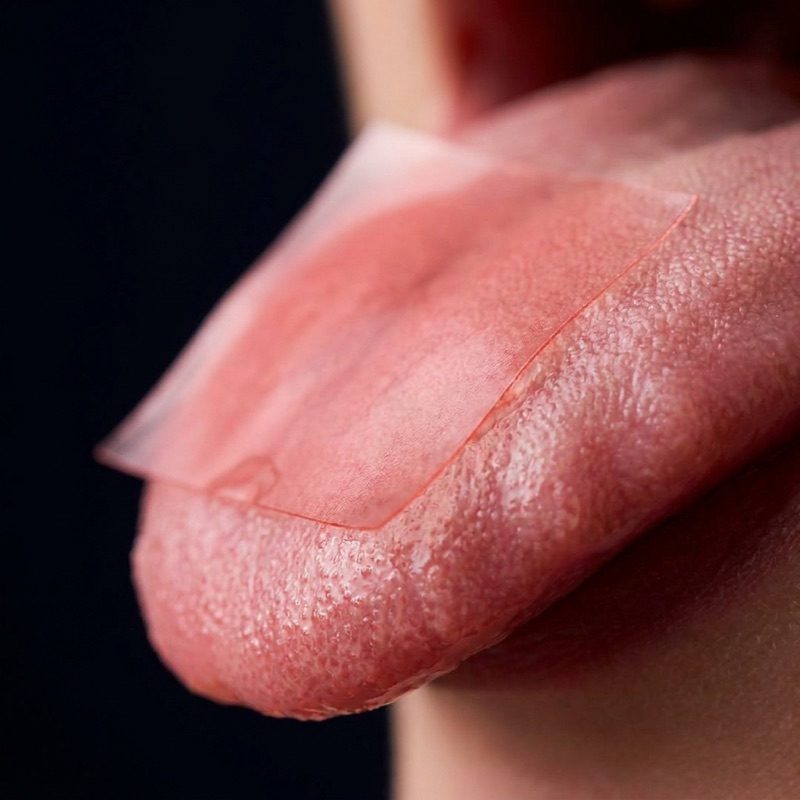 Cognitive Relax Strips dissolving on the tongue