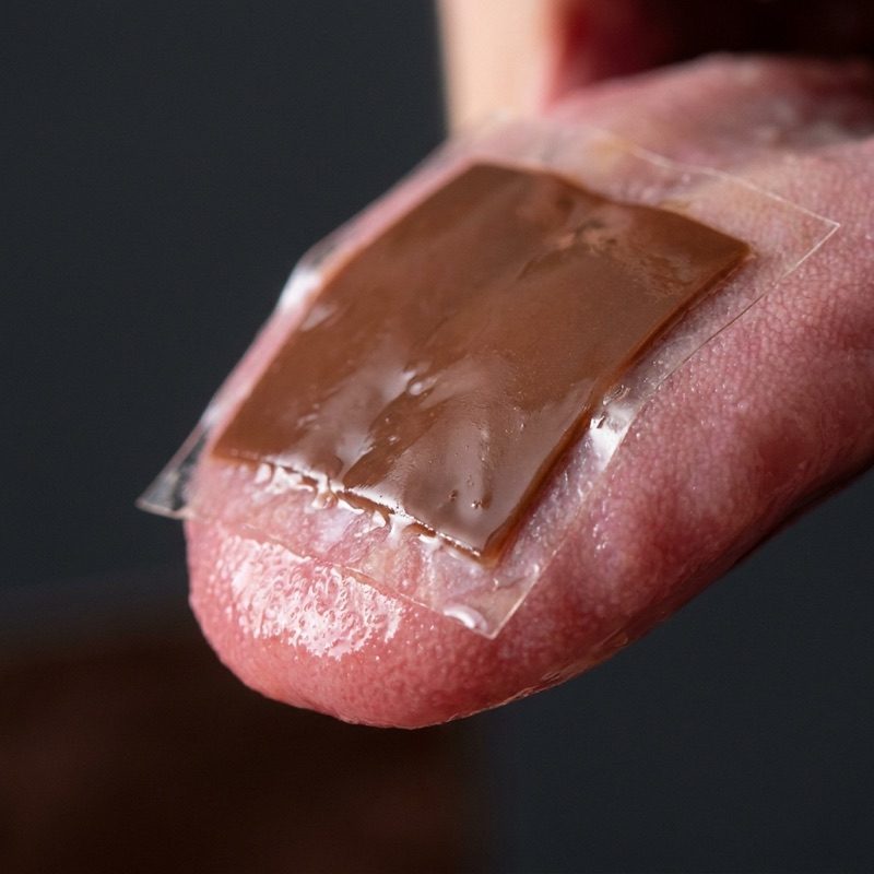 Mushroom Focus Strips dissolving on the tongue